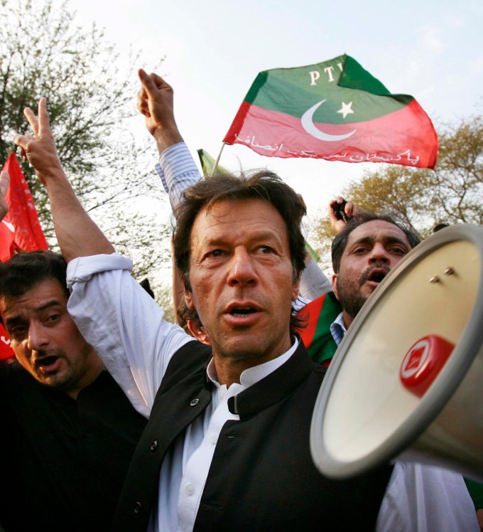 Khan, the chief of Tehrik-e-Insaf party, chants slogans against Pakistani President Musharraf during protest in Islamabad